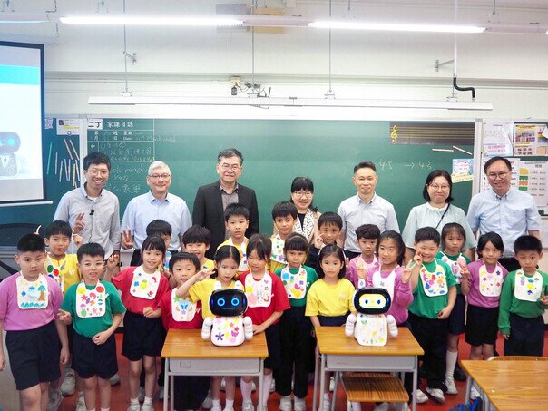 A group photo of the “Loving Baby” team, representatives from the Li Ka Shing Foundation, and the principal of the primary school on campus